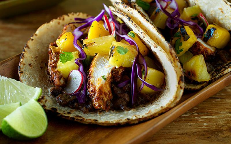 Jamaican Jerk Chicken Tacos with Grilled Pineapple-Mango Salsa